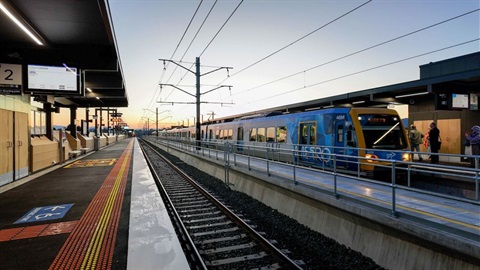 Croydon Station looking from the platform as a train rolls in