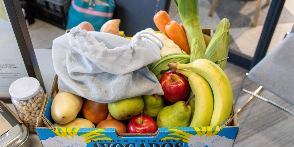 Fresh fruit with a reusable grocery bag